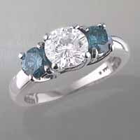 white and blue diamond ring in white gold setting